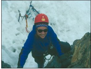Jill Chopus summiting Pequenyo Alpamayo, Photo by Molly Douma